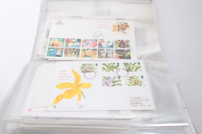 Lot 1278 - One box of first day covers housed in four albums.