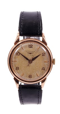 Lot 705 - 1950s gentlemen’s Longines gold wristwatch