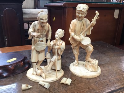 Lot 595 - Late 19th century Japanese carved ivory figures