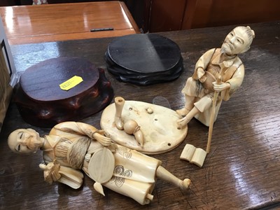 Lot 595 - Late 19th century Japanese carved ivory figures