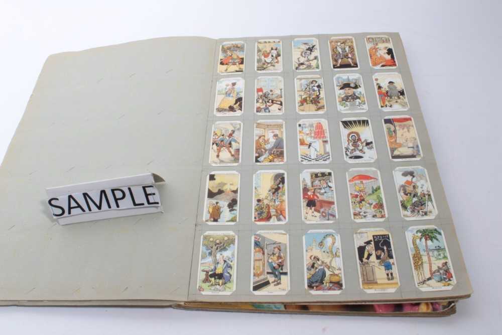 Lot 14 - Two albums of cigarette cards