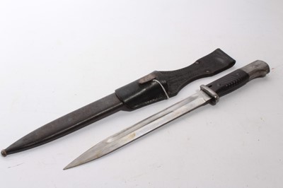 Lot 856 - Second World War Nazi German K98 bayonet with fullered steel blade stamped 43 fnj, 2233 in scabbard with leather frog