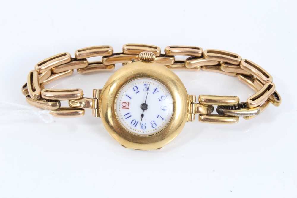 Lot 32 - Ladies' 18ct gold cased wristwatch on expandable bracelet