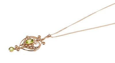 Lot 606 - Edwardian style 9ct gold and peridot and seed pearl pendant on chain