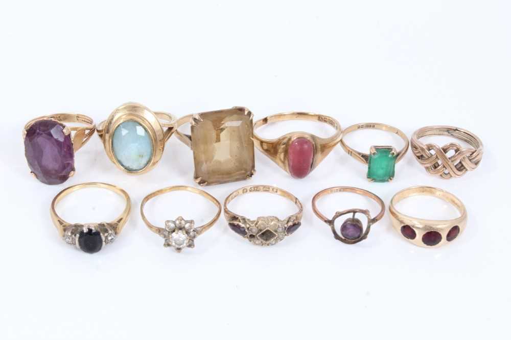Lot 12 - Eleven gold and yellow metal gem set dress rings