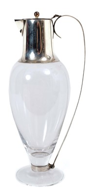Lot 344 - Contemporary silver mounted claret jug, with clear glass body