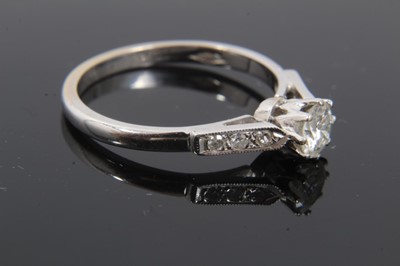Lot 122 - 18ct white gold diamond solitaire ring with diamond set shoulders