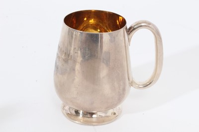 Lot 351 - Victorian silver Guernsey cream jug of conventional form, and a christening mug