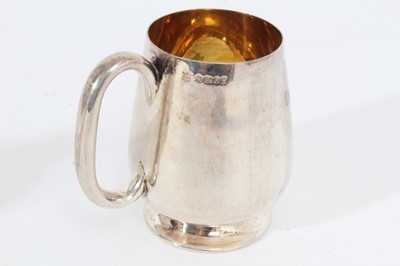 Lot 351 - Victorian silver Guernsey cream jug of conventional form, and a christening mug