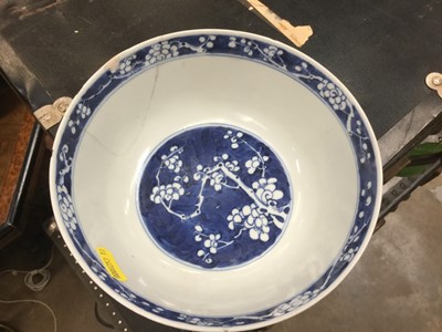 Lot 150 - 19th century Chinese porcelain bowl with prunus decoration on crushed ice ground, double ring and character marks to base