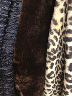 Lot 1914 - 1960s faux Leopard skin coat with swing back.  Faux Persian Lamb fur coat plus a brown beaver laver coat.