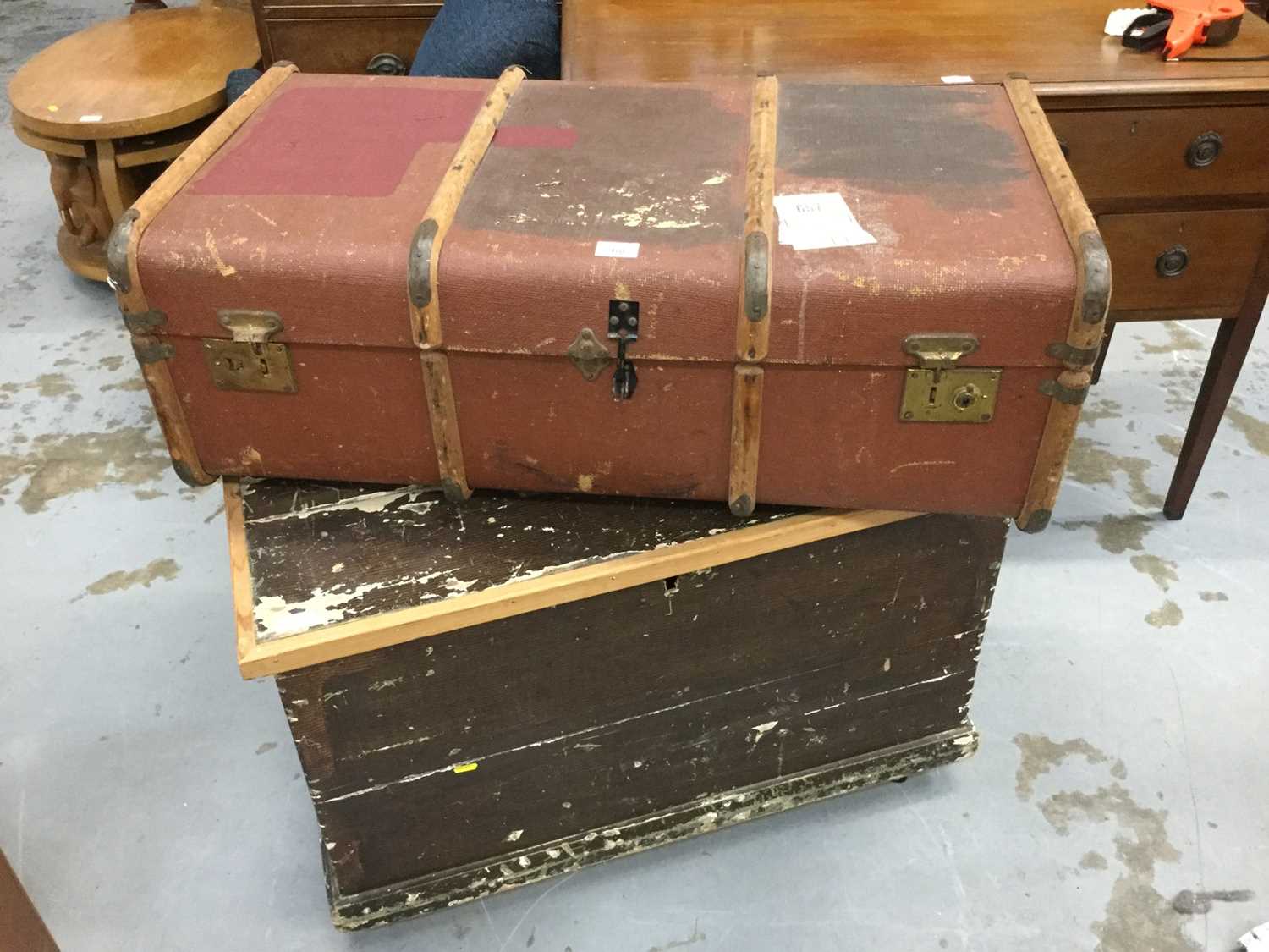 Lot 918 - Antique pine tool chest on casters, together with a canvas covered trunk (2)