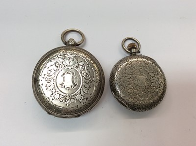 Lot 671 - Two silver cased fob watches, spherical glass pocket watch and a watch chain