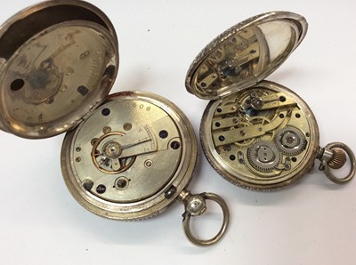 Lot 671 - Two silver cased fob watches, spherical glass pocket watch and a watch chain