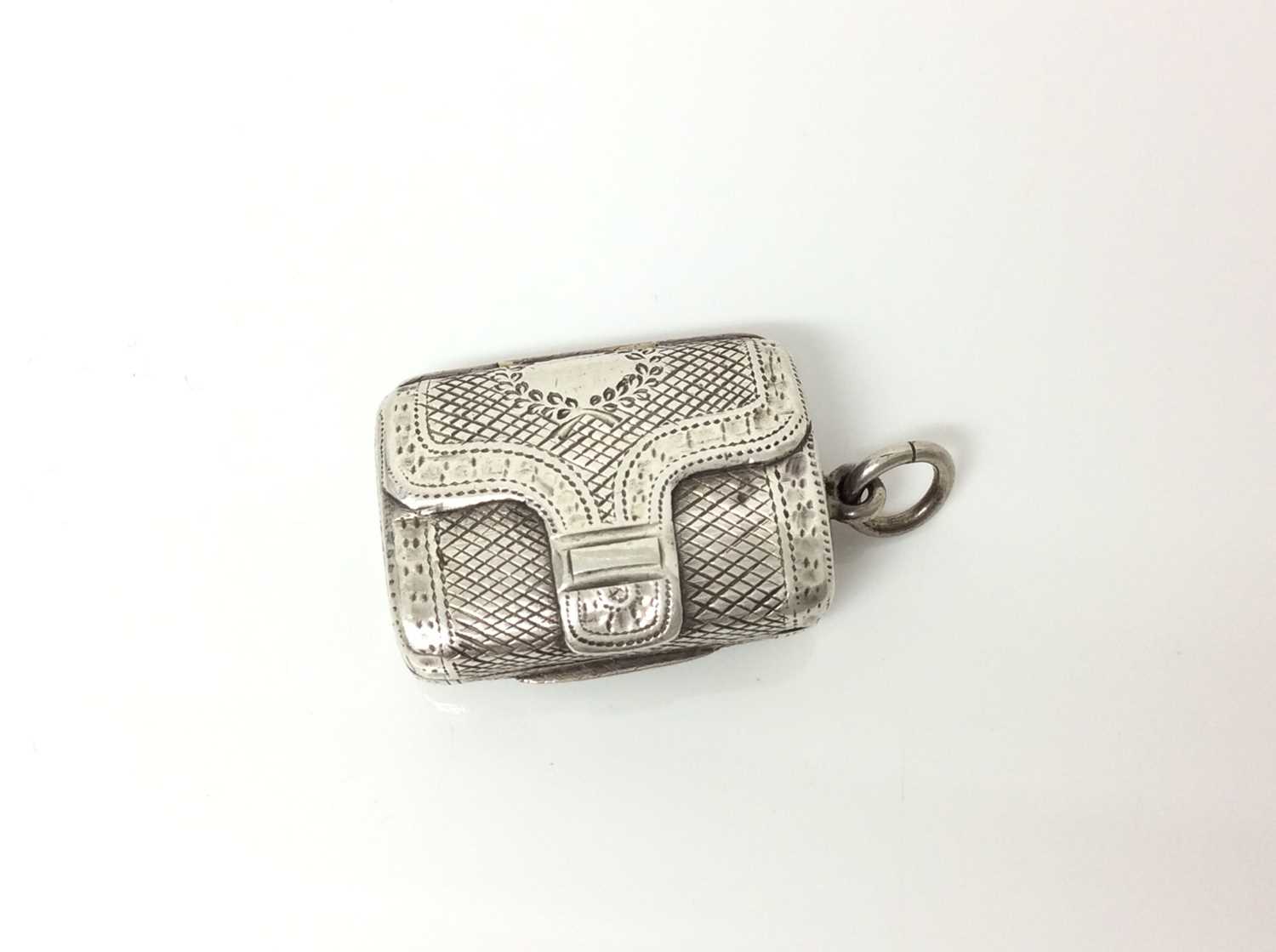 Lot 352 - George III silver vinaigrette in the form of a purse.