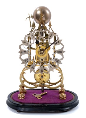 Lot 751 - Victorian brass Skeleton clock and key