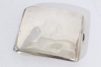Lot 380 - Two 1920s silver cigarette boxes, a silver cigarette case and one other case.
