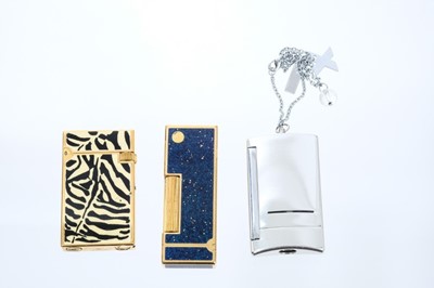 Lot 634 - Dunhill Gold plated lighter together with two DuPont lighters, one with pouch