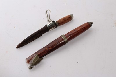 Lot 971 - Antique Turkish knife, with script to blade in leather sheath together with another similar knife (2)