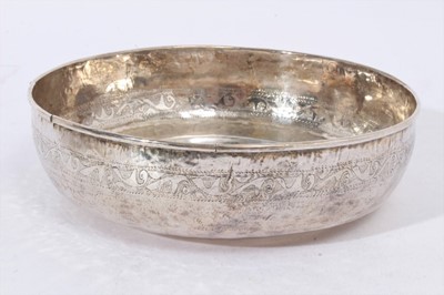 Lot 389 - Eastern White metal bowl with characters to the centre possibly Sudanese
