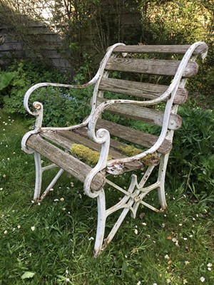 Lot 1321 - Antique cast iron and wooden slatted white painted garden chair