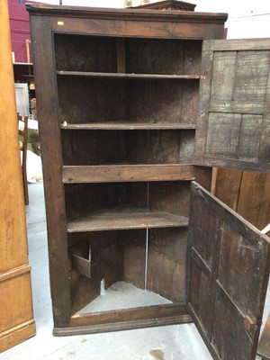 Lot 964 - Early 19th century oak two height corner cupboard with panelled doors 183 cm high, 96 cm wide