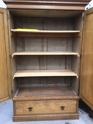 Lot 970 - Large Victorian grained pine linen cupboard with two panelled doors enclosing shelves and drawer below 230 cm high x 155 cm wide x 57 cm deep