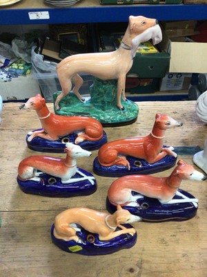 Lot 13 - Six Staffordshire pottery greyhounds, Victorian and later