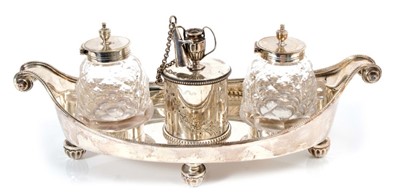 Lot 370 - Victorian silver ink stand of boat shaped form, with bead border and scroll ends