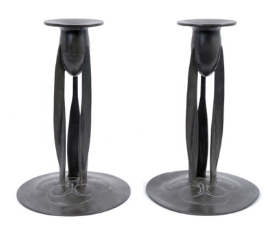 Lot 866 - Pair of Art Nouveau Liberty pewter candlesticks designed by Archibald Knox, model number 0223