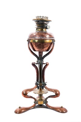 Lot 971 - Arts and crafts copper lamp in the manner of Benson