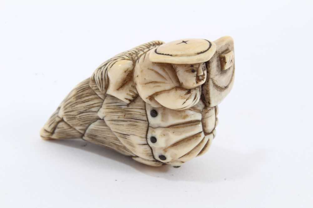 Lot 970 - 19th century Japanese carved ivory netsuke
