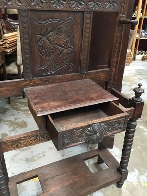 Lot 341 - Late Victorian carved oak hall stand with bobbin supports, mirror and drawer , 205 cm high, 89 cm