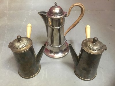Lot 180 - Pair of Georgian Ols Sheffield plate chocolate pots, together with a 19th century Old Sheffield plate hot water jug. (3)