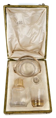 Lot 373 - French silver gilt and cut glass liquor set.