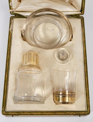 Lot 373 - French silver gilt and cut glass liquor set.