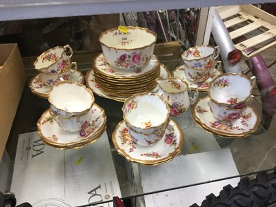 Lot 306 - Hammersley 10 place setting teaset with floral and gilt decoration