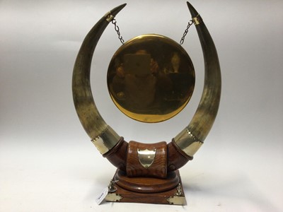 Lot 2210 - Edwardian oak and brass dinner gong with cow horn supports