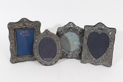 Lot 442 - Three silver photograph frames and one other silver plate