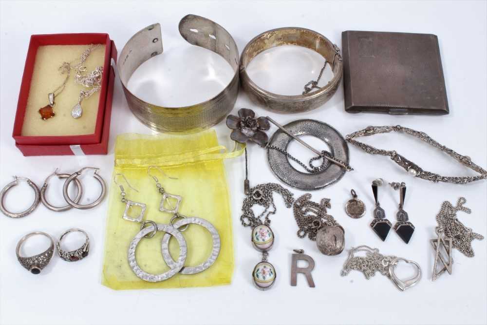 Lot 10 - Group silver and white metal jewellery to include two silver bangles, pendants, chains, earrings, gem set ring and silver compact