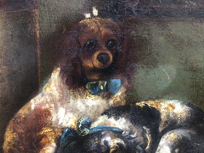 Lot 58 - After Sir Edwin Landseer, oil on canvas - two King Charles spaniels on a table, unframed, 44cm x 56cm