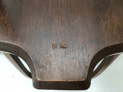Lot 25 - Oak oval drop leaf dining table and a set of six oak wheelback chairs