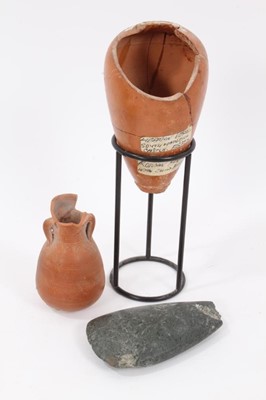 Lot 868 - Cyprus Green stone Neolithic axe head and two Roman Samian ware pots with local provenance (3)