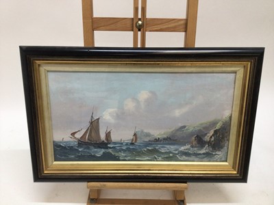 Lot 232 - Pair of late 19th century oils on board - shipping and a shipwreck off the coast, 23cm x 45cm, in glazed frames