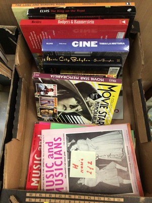 Lot 108 - Four boxes of books, mostly military, music and film