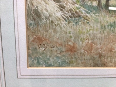 Lot 197 - Charles Gregory (1849-1920) - watercolour in glazed gilt frame - rural landscape with mother and baby, and figures in hayfield with cottages beyond, signed, 36cm x 18cm