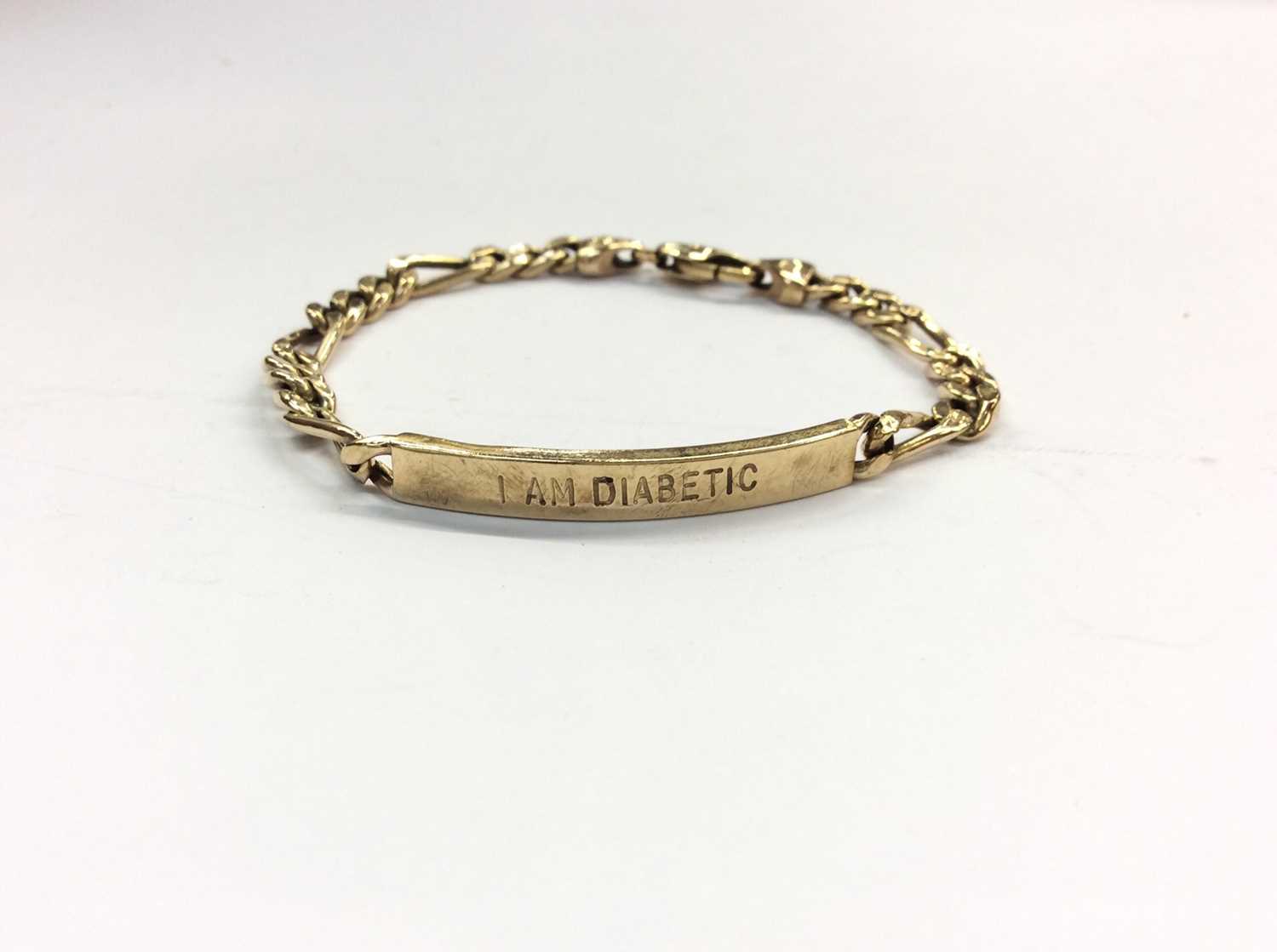 Lot 715 - 9ct gold identity bracelet