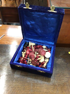 Lot 130 - Velvet box containing ivory chess pieces