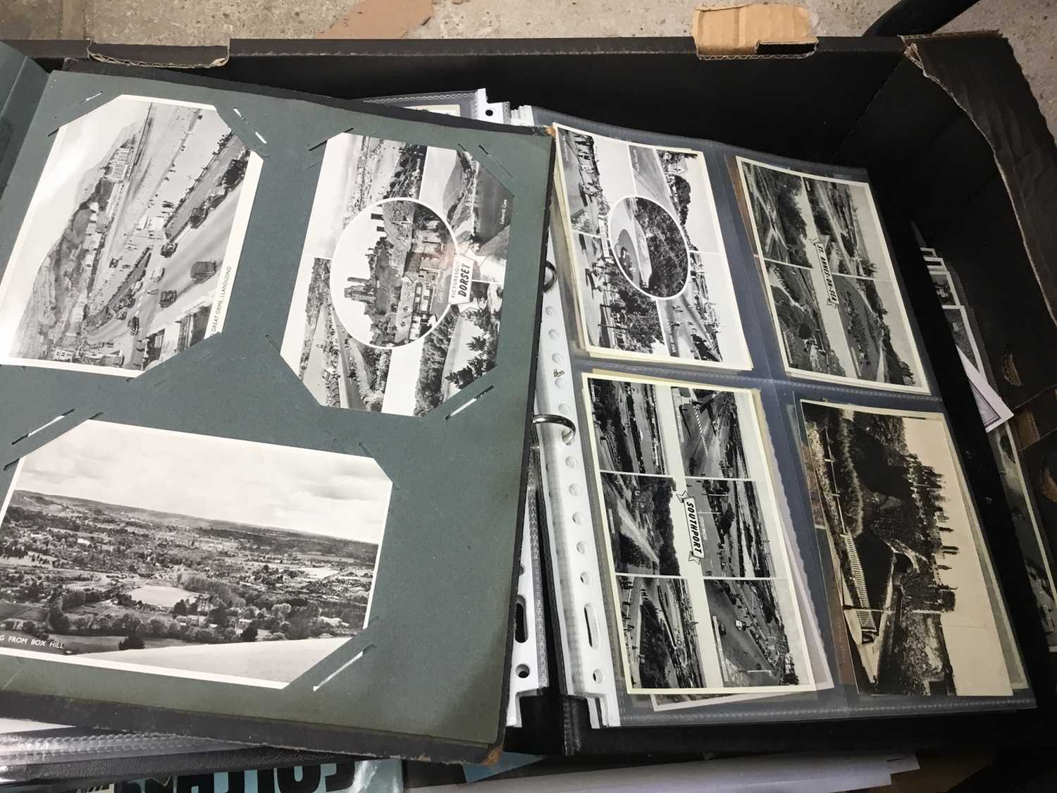 Lot 283 - Albums of vintage postcards, and ephemera