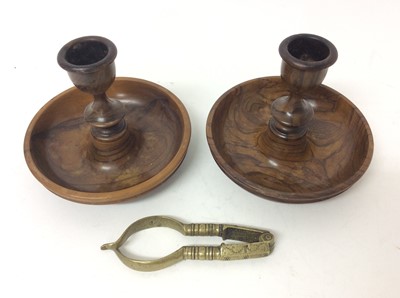 Lot 981 - Pair of 18th century brass nut crackers together with a walnut Brighton bun collapsible pair of candlestics